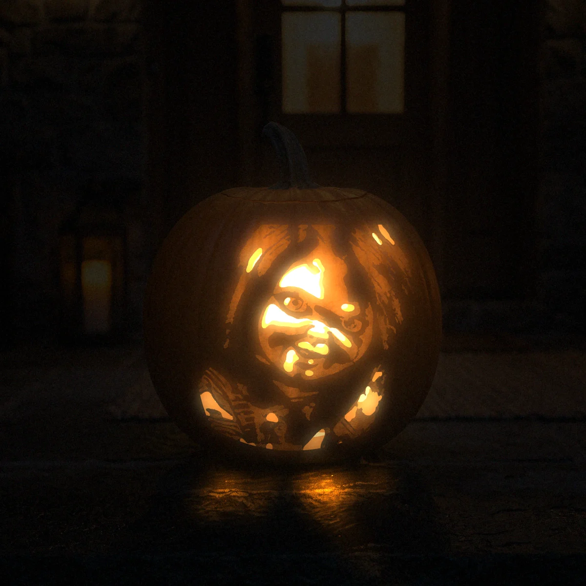 Chucky carved into a pumpkin and lit on a doorstep at night