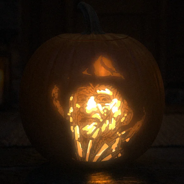Freddy Krueger carved into a glowing pumpkin